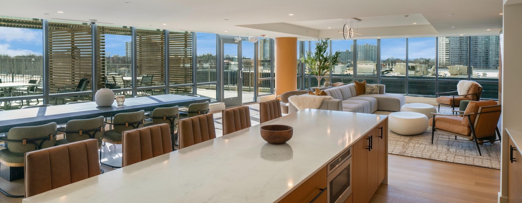 a clubroom with a table and chairs
