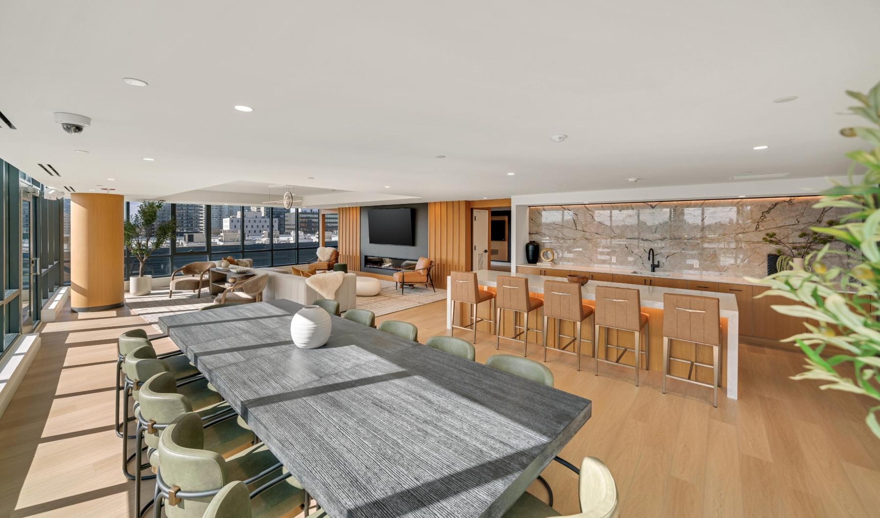 a clubroom with a table and chairs