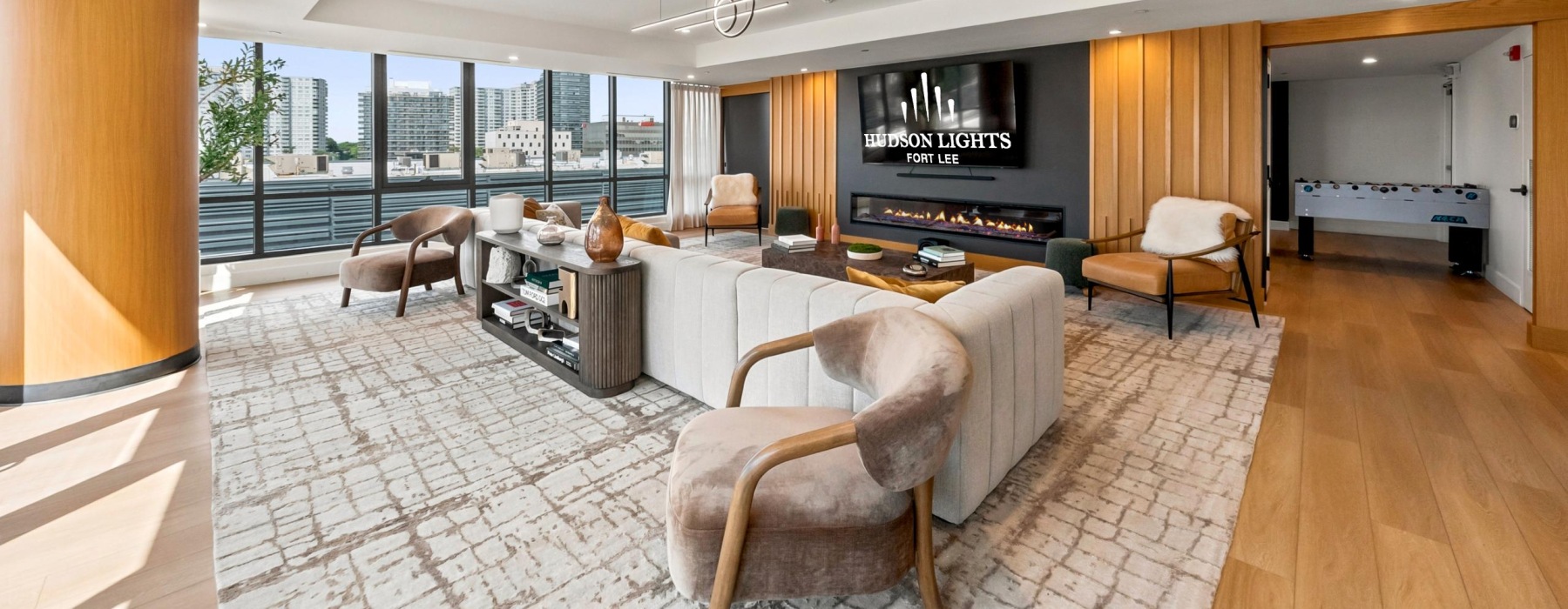 a clubroom with a table and chairs